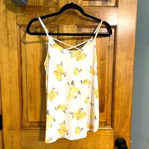 Kaileigh, size Small, white with lemon and leaf pattern with a lattice back.